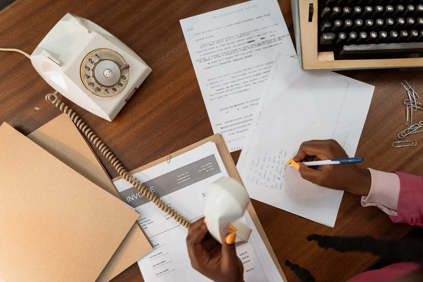 A business letter and documents on a desk