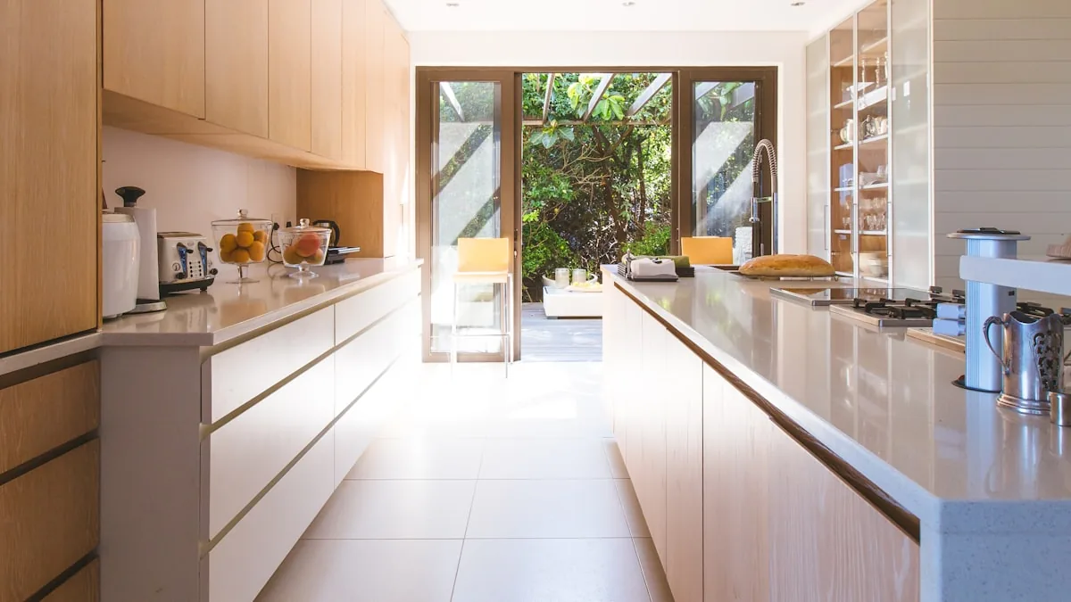 A bright, modern kitchen with a view onto the garden