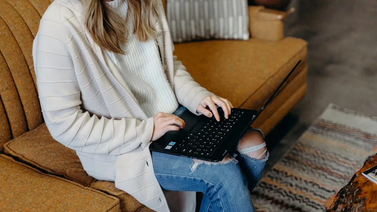Someone browsing property listings on a laptop on the sofa
