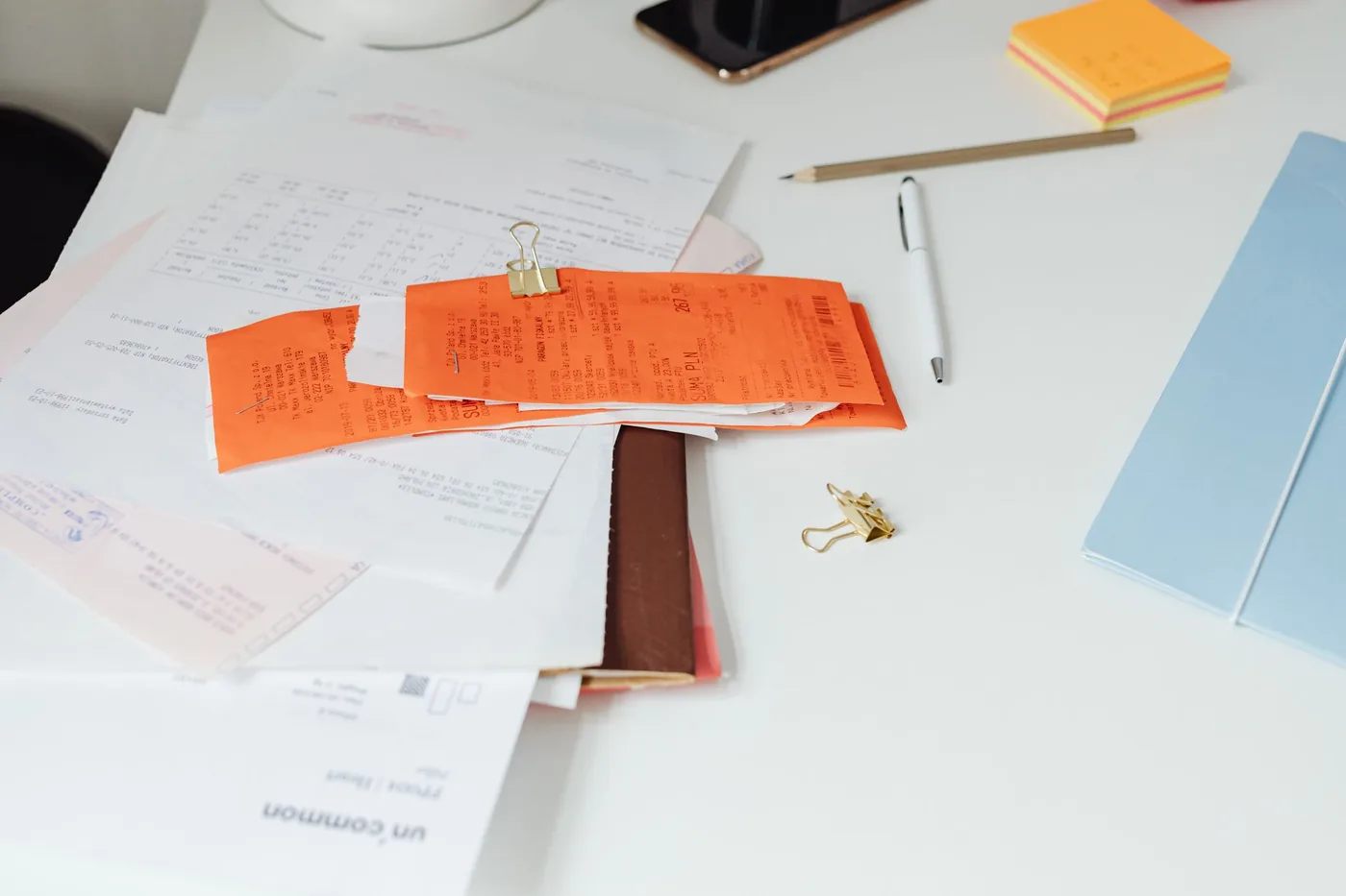 Receipts and documents on a desk